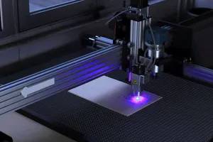 Close-up of a CNC laser engraving machine processing a wooden piece. jigsaw puzzle