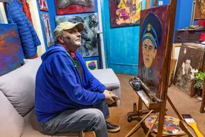 An artist in a vibrant studio working on a portrait of a military officer. Creative and inspiring setting. jigsaw puzzle