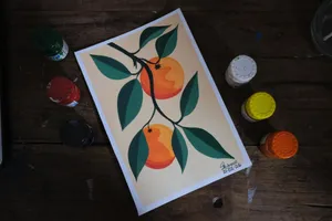 Colorful painting of oranges with surrounding paint bottles on wooden surface. jigsaw puzzle