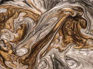 Close-up of a stunning abstract marble texture with swirling gold and gray patterns, perfect for backgrounds. jigsaw puzzle
