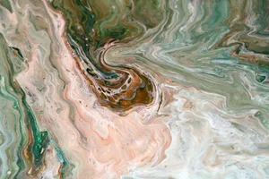 Captivating abstract fluid art featuring swirling green and peach hues with a natural marbled pattern. jigsaw puzzle