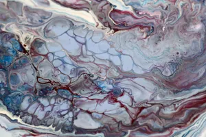 Vibrant abstract fluid art featuring swirling marbled colors in a captivating pattern. jigsaw puzzle