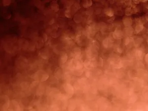 A blurred abstract orange bokeh pattern ideal for creative design uses. jigsaw puzzle