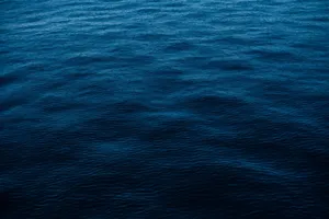 Vivid depiction of deep blue ocean surface, perfect for backgrounds and wallpapers. jigsaw puzzle