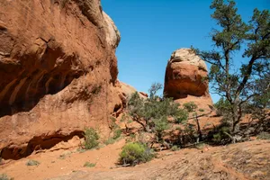 A large rock formation in the middle of a desert jigsaw puzzle