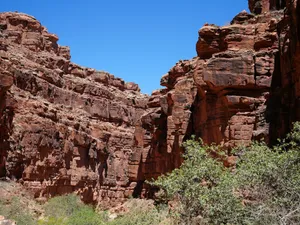 A large rock formation in the middle of a desert jigsaw puzzle