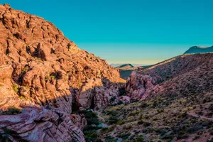a view of a mountain with a road going through it jigsaw puzzle