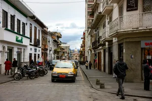 black car on road near buildings during daytime jigsaw puzzle