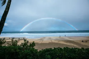 rainbow over the beach during daytime jigsaw puzzle