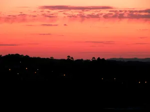 a plane is flying in the sky at sunset jigsaw puzzle