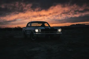 vintage ford mustang in desert at sunset jigsaw puzzle