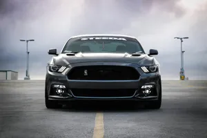 black Shelby car on road jigsaw puzzle