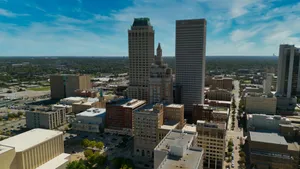 Tall skyscrapers dominate a sunny urban cityscape. jigsaw puzzle