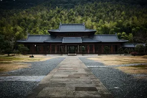 A large building sitting in the middle of a forest jigsaw puzzle