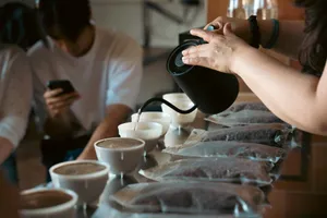 Barista pouring water into a cup for coffee. jigsaw puzzle