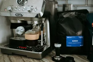 Espresso machine brewing coffee next to coffee bag. jigsaw puzzle