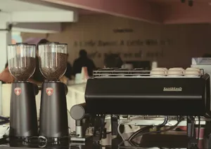 Espresso machine and coffee grinders in a cafe. jigsaw puzzle