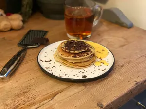 chocolate pancake served in white and black plate jigsaw puzzle