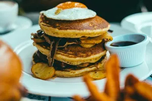burger with fried fries on white ceramic plate jigsaw puzzle