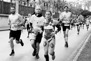 grayscale photography of jogging people jigsaw puzzle