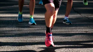 a group of people running down a street jigsaw puzzle