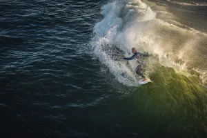 person doing surfboard jigsaw puzzle