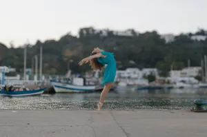 Ballerina performing a graceful dance by the water jigsaw puzzle