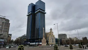 a group of fire fighters standing in front of a tall building jigsaw puzzle