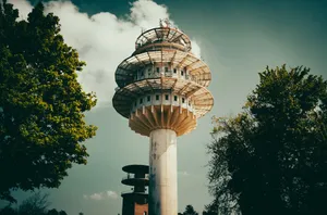 a tall tower with trees around it jigsaw puzzle