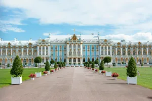 a large building with many windows with Catherine Palace in the background jigsaw puzzle