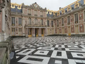 a large building with a black and white checkered floor jigsaw puzzle