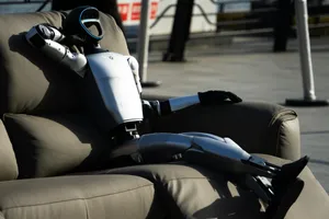 Robot relaxes comfortably on a couch. jigsaw puzzle