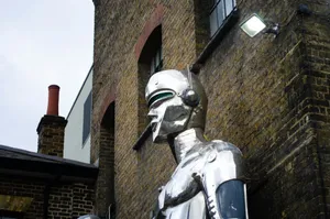 gray concrete statue beside concrete building jigsaw puzzle