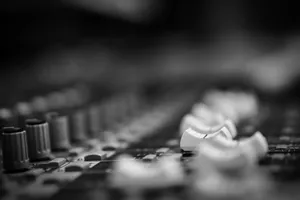 selective grayscale photography of mixing console jigsaw puzzle