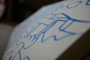 Blue abstract drawing on a white canvas jigsaw puzzle