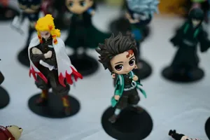 Anime figurines displayed on a table jigsaw puzzle
