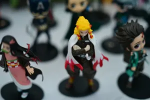 Anime figurines displayed on a white surface jigsaw puzzle