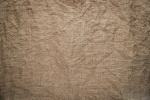brown textile on brown wooden table jigsaw puzzle