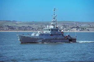 a large boat in the middle of a body of water jigsaw puzzle