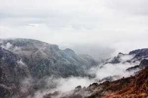 Scenic view of foggy mountains in Divriği, Turkey, showcasing dramatic terrain and cloudy sky. jigsaw puzzle