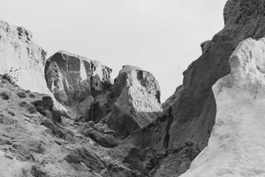 Captivating black and white view of rocky cliffs in Canoa Quebrada, showcasing natural beauty and texture. jigsaw puzzle