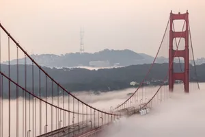 Iconic Golden Gate Bridge enveloped in a dreamy morning fog captured from above San Francisco. jigsaw puzzle