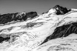 A breathtaking view of the Jungfrau snow-capped peaks in monochrome elegance. jigsaw puzzle