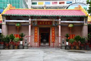 Explore the vibrant entrance of a traditional Chinese temple in Ho Chi Minh City, Vietnam. jigsaw puzzle