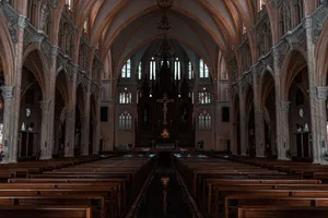 Beautiful view of a Gothic cathedral's interior with detailed arches and altar. jigsaw puzzle