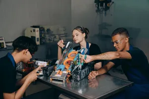Students engaged in assembling a robotics project in an educational lab setting. jigsaw puzzle