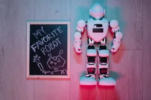 Playful scene of a white robot toy and chalkboard drawing on wooden floor. jigsaw puzzle