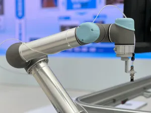 Detailed close-up of a modern industrial robotic arm in a manufacturing setting. jigsaw puzzle