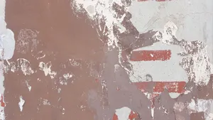Close-up of a wall with peeling paint and weathered textures, ideal for backgrounds. jigsaw puzzle