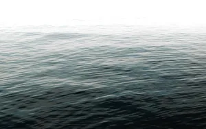 a large body of water with a boat in the distance jigsaw puzzle